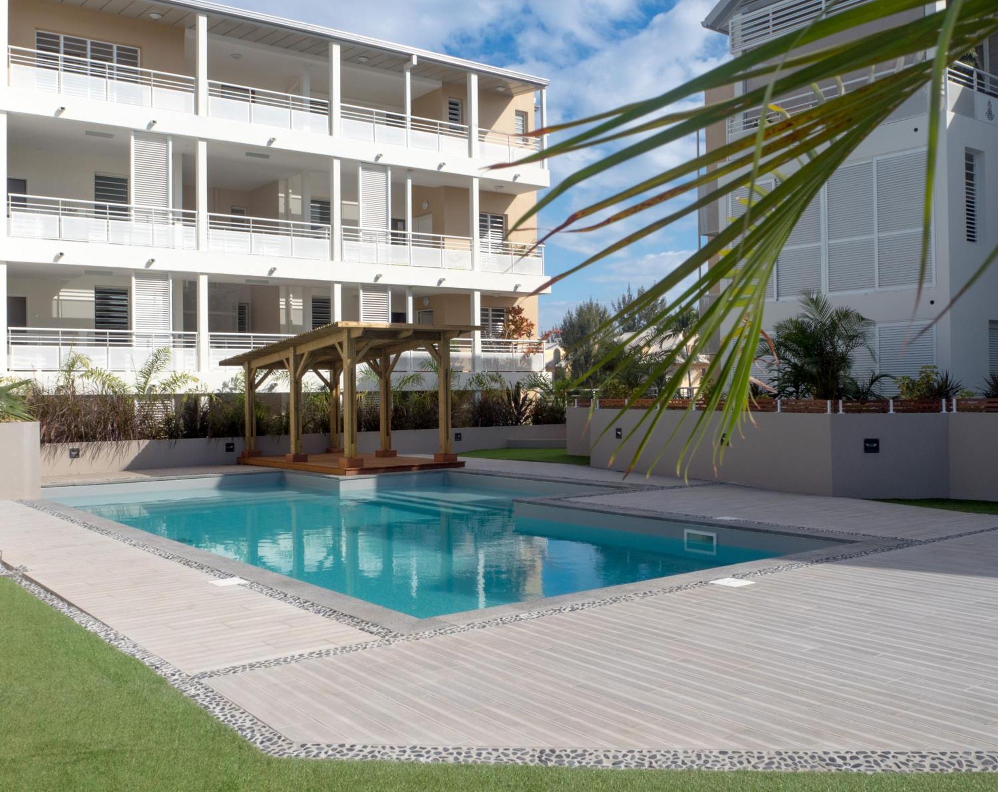 شقة Escale Tropicale, Appart Vue Mer A 2 Min Du Lagon سان جيل لي بان المظهر الخارجي الصورة